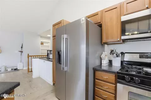 Kitchen - 11801 Falklands Dr # 75, Eagle River, AK 99577 photo 4 of 4