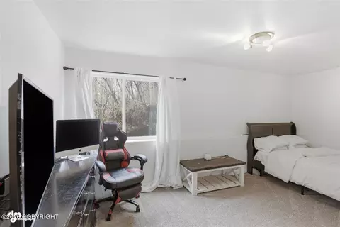 Bedroom - 12309 Vista Ridge Loop # 59, Eagle River, AK 99577 photo 5 of 5