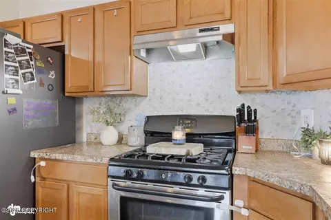 Kitchen - 12309 Vista Ridge Loop # 59, Eagle River, AK 99577 photo 3 of 4