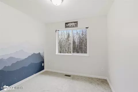 Bedroom - 12309 Vista Ridge Loop # 59, Eagle River, AK 99577 photo 4 of 5