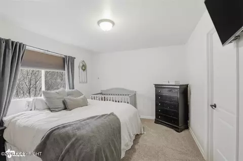 Bedroom - 12309 Vista Ridge Loop # 59, Eagle River, AK 99577 photo 2 of 5