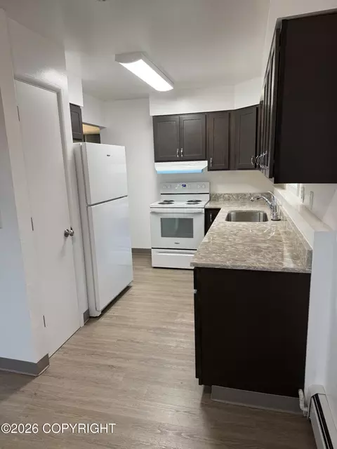 Kitchen - 6952 Weimer Rd, Anchorage, AK 99502 photo 2 of 3