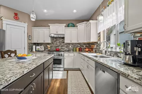 Kitchen - 21930 Sheltering Spruce Loop, Chugiak, AK 99567 photo 4 of 9
