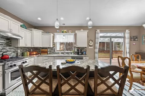 Kitchen - 21930 Sheltering Spruce Loop, Chugiak, AK 99567 photo 3 of 9