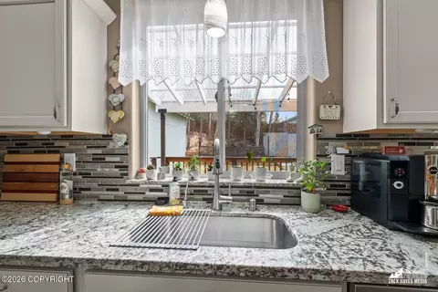 Kitchen - 21930 Sheltering Spruce Loop, Chugiak, AK 99567 photo 5 of 9