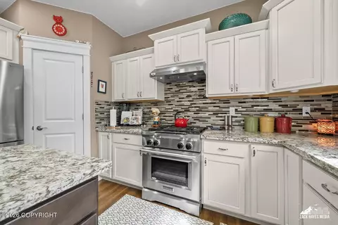 Kitchen - 21930 Sheltering Spruce Loop, Chugiak, AK 99567 photo 6 of 9