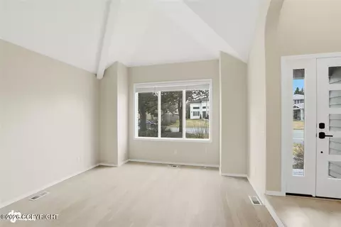 Living - 7513 Setter Dr, Anchorage, AK 99502 photo 1 of 7