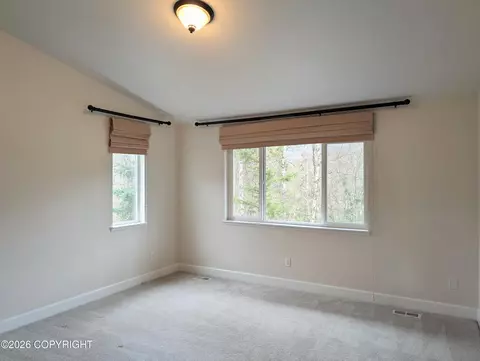 Bedroom - 20868 Trailhead Ave # 8, Eagle River, AK 99577 photo 4 of 9