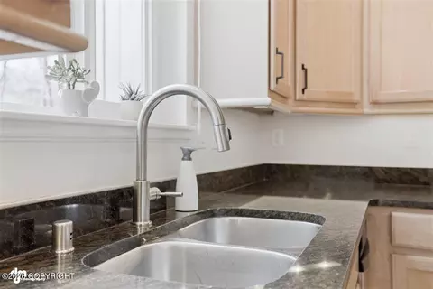 Kitchen - 20868 Trailhead Ave # 8, Eagle River, AK 99577 photo 6 of 7
