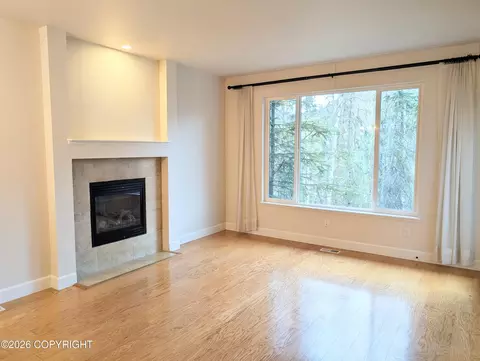 Living - 20868 Trailhead Ave # 8, Eagle River, AK 99577 photo 3 of 8