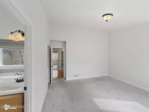 Bedroom - 20868 Trailhead Ave # 8, Eagle River, AK 99577 photo 2 of 9
