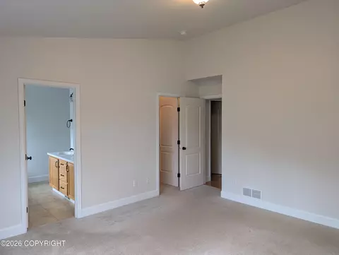 Bedroom - 20868 Trailhead Ave # 8, Eagle River, AK 99577 photo 3 of 9