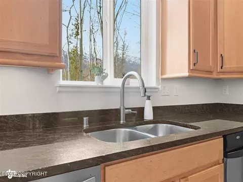 Kitchen - 20868 Trailhead Ave # 8, Eagle River, AK 99577 photo 5 of 7