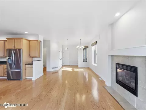 Living - 20868 Trailhead Ave # 8, Eagle River, AK 99577 photo 1 of 8
