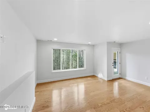 Living - 20868 Trailhead Ave # 8, Eagle River, AK 99577 photo 6 of 8