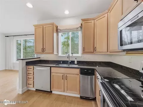 Kitchen - 20868 Trailhead Ave # 8, Eagle River, AK 99577 photo 2 of 7