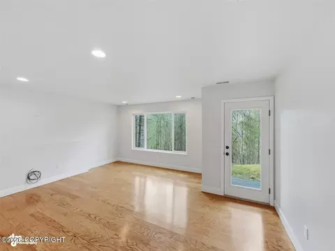 Living - 20868 Trailhead Ave # 8, Eagle River, AK 99577 photo 8 of 8