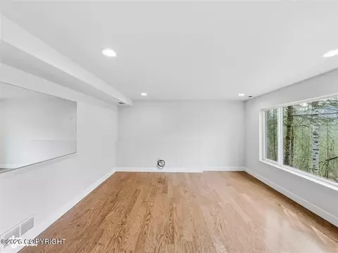 Living - 20868 Trailhead Ave # 8, Eagle River, AK 99577 photo 7 of 8