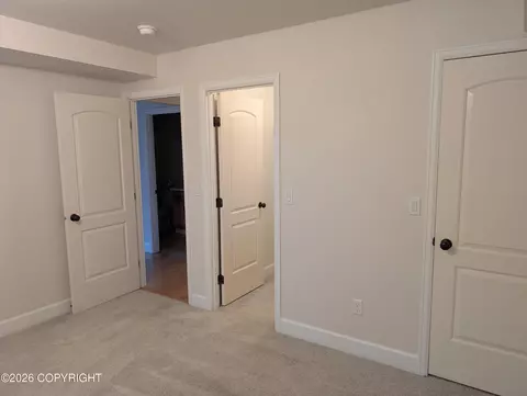 Bedroom - 20868 Trailhead Ave # 8, Eagle River, AK 99577 photo 7 of 9