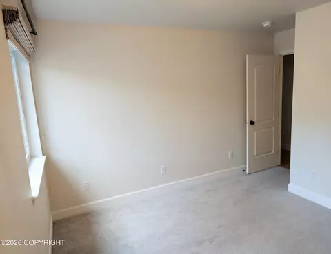 Bedroom - 20868 Trailhead Ave # 8, Eagle River, AK 99577 photo 6 of 9