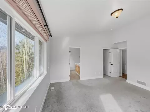 Bedroom - 20868 Trailhead Ave # 8, Eagle River, AK 99577 photo 1 of 9