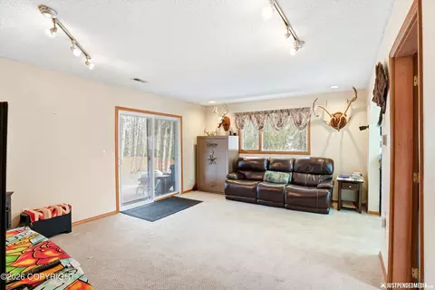 Living - 9515 Dundas Cir, Eagle River, AK 99577 photo 4 of 5