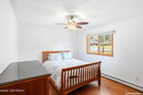 Bedroom - 19430 Citation Rd, Eagle River, AK 99577 photo 5 of 16