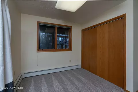 Bedroom - 19430 Citation Rd, Eagle River, AK 99577 photo 7 of 16