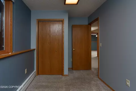 Bedroom - 19430 Citation Rd, Eagle River, AK 99577 photo 9 of 16