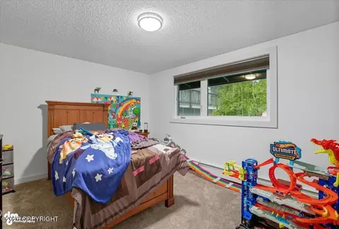 Bedroom - 3801 Runestad Cir, Anchorage, AK 99502 photo 1 of 7