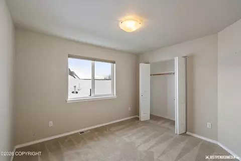 Bedroom - 1007 Northpointe Bluff Dr, Anchorage, AK 99501 photo 3 of 5