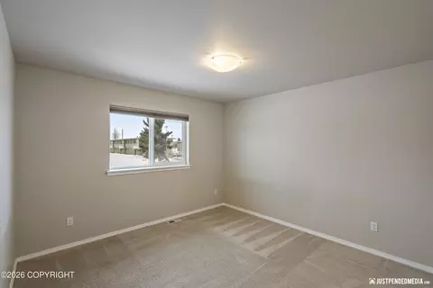 Bedroom - 1007 Northpointe Bluff Dr, Anchorage, AK 99501 photo 2 of 5