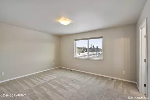 Bedroom - 1007 Northpointe Bluff Dr, Anchorage, AK 99501 photo 4 of 5