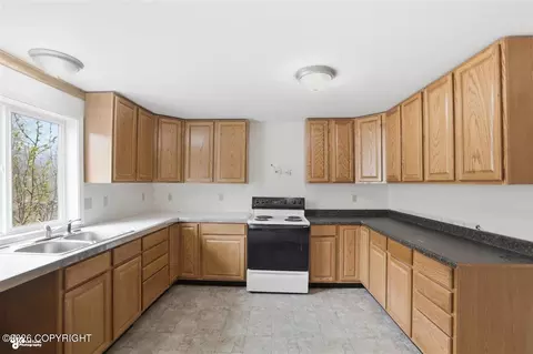 Kitchen - 32907 Cirrus Way, Eagle River, AK 99577 photo 1 of 8