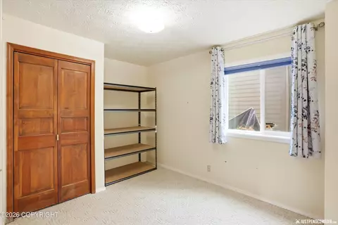 Bedroom - 9703 Newhaven Loop, Anchorage, AK 99507 photo 6 of 7