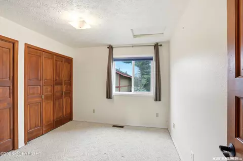 Bedroom - 9703 Newhaven Loop, Anchorage, AK 99507 photo 2 of 7
