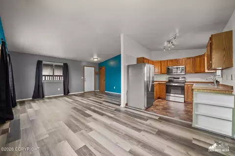Living - 6910 Ryan Ct, Anchorage, AK 99504 photo 4 of 6