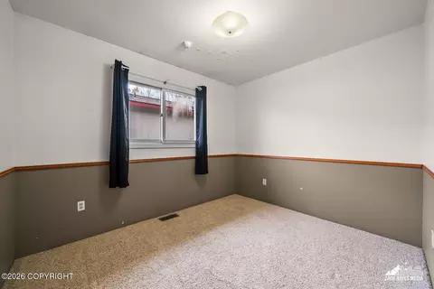 Bedroom - 6910 Ryan Ct, Anchorage, AK 99504 photo 2 of 3
