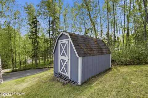 Exterior - 21818 Cloverleaf Rd, Chugiak, AK 99567 photo 4 of 10