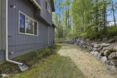 Exterior - 21818 Cloverleaf Rd, Chugiak, AK 99567 photo 7 of 10