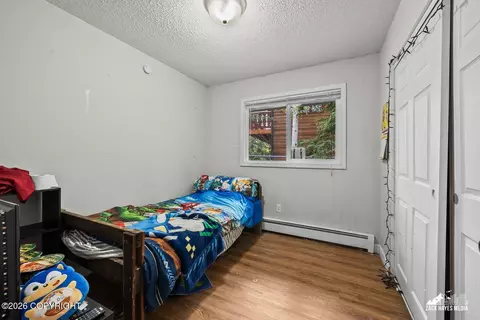 Bedroom - 647 E 73rd Ave, Anchorage, AK 99518 photo 5 of 8