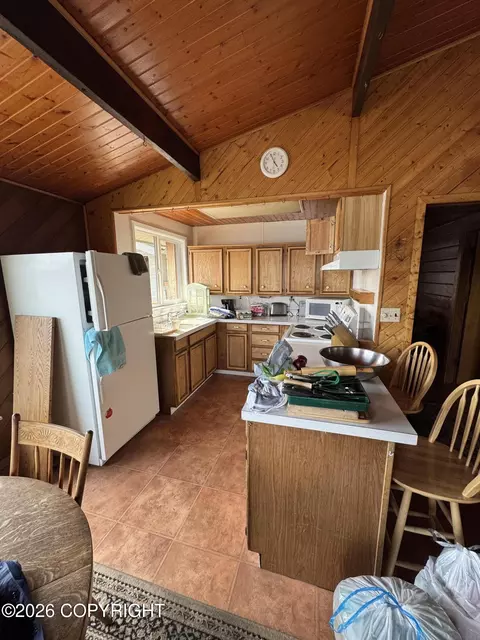 Kitchen - 440 Main St, Port Lions, AK 99550 photo 1 of 2