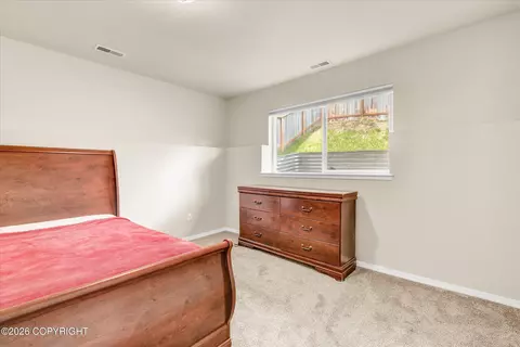 Bedroom - 20469 Icefall Dr, Eagle River, AK 99577 photo 7 of 7
