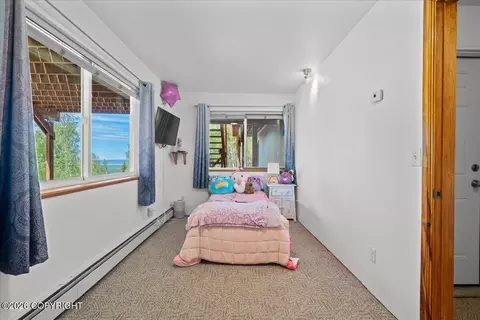 Bedroom - 19010 Upper Fish Hatchery Rd, Eagle River, AK 99577 photo 8 of 12