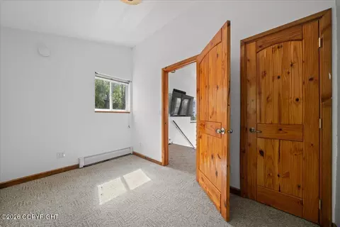 Bedroom - 19010 Upper Fish Hatchery Rd, Eagle River, AK 99577 photo 2 of 12