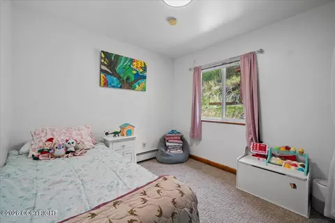Bedroom - 19010 Upper Fish Hatchery Rd, Eagle River, AK 99577 photo 11 of 12