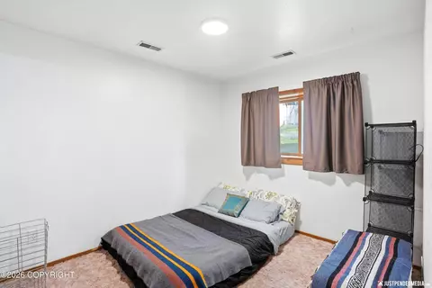 Bedroom - 18327 Hidden Falls Ave, Eagle River, AK 99577 photo 3 of 4