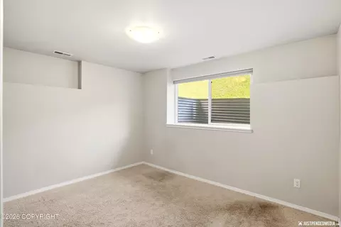 Bedroom - 20485 Icefall Dr, Eagle River, AK 99577 photo 4 of 7
