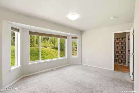Bedroom - 20485 Icefall Dr, Eagle River, AK 99577 photo 2 of 7