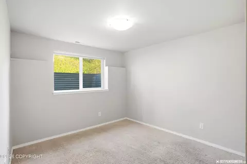 Bedroom - 20485 Icefall Dr, Eagle River, AK 99577 photo 6 of 7